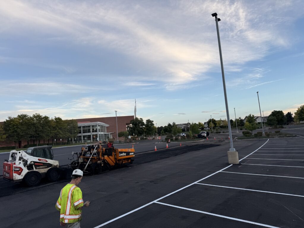 Clear Choice Paving crew laying asphalt at commercial property in Colorado Springs