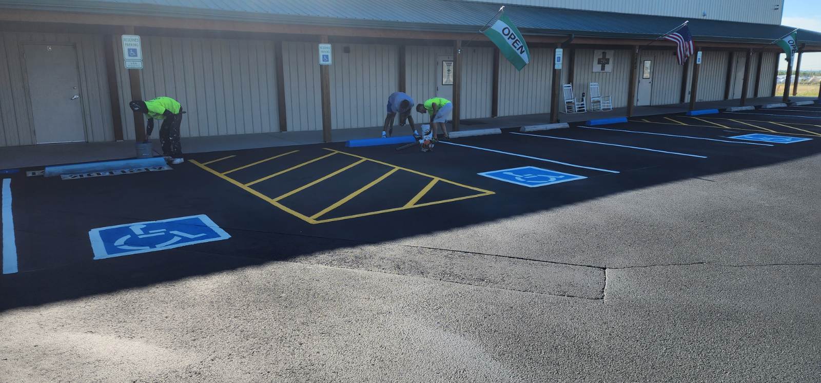 Sealcoating equipment on commercial job site Colorado Springs